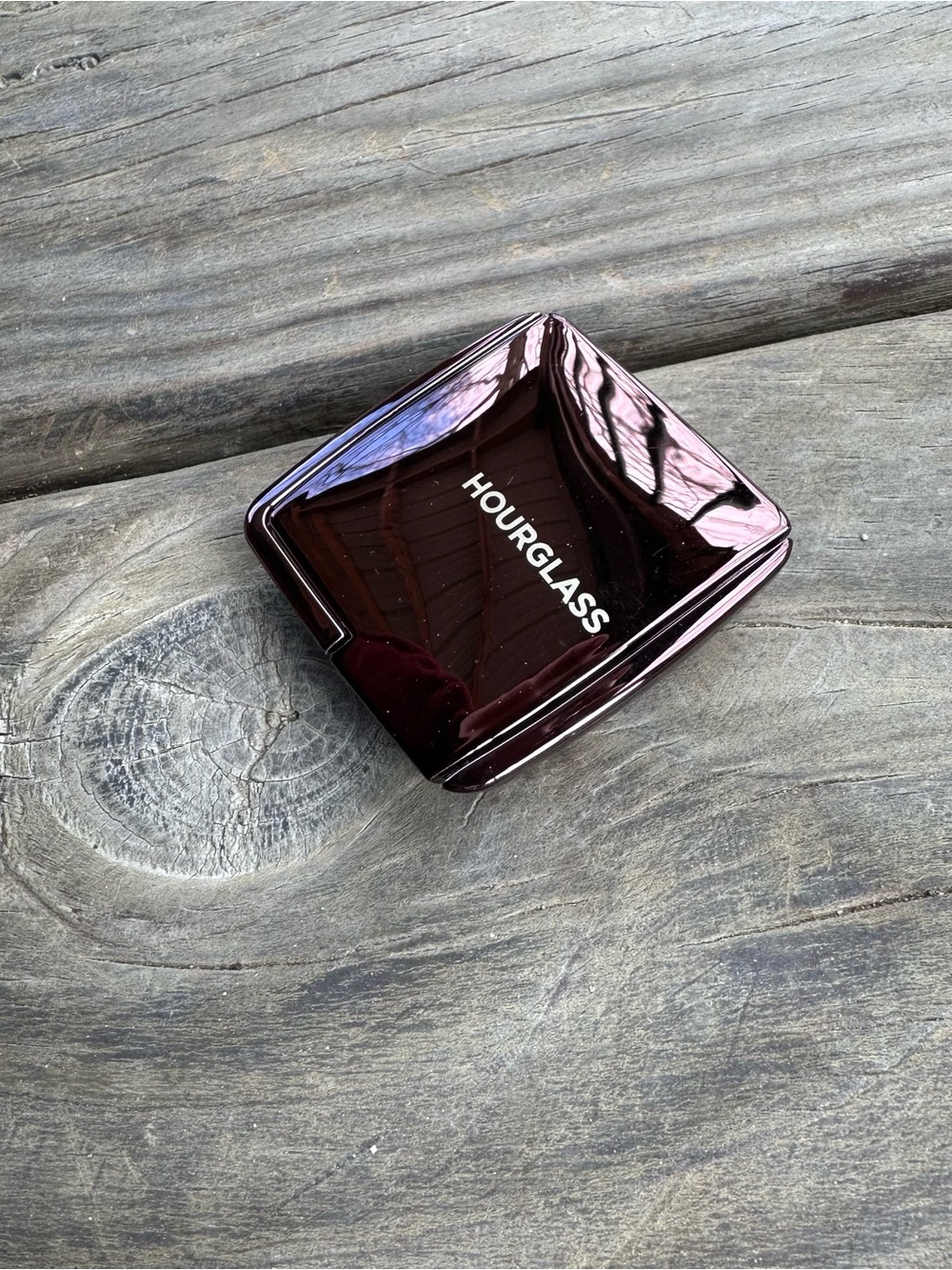 Hourglass Ambient lighting powder in “Diffused Light” (soft, warm pale yellow)